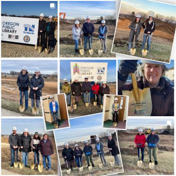 staff members at the site of the new library
